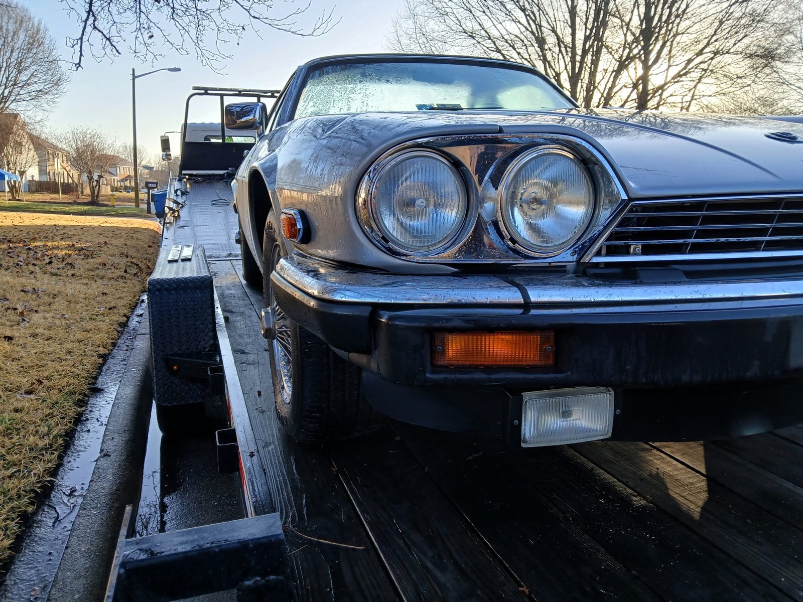 Spartan Towing off-loading a vehicle off a trailer